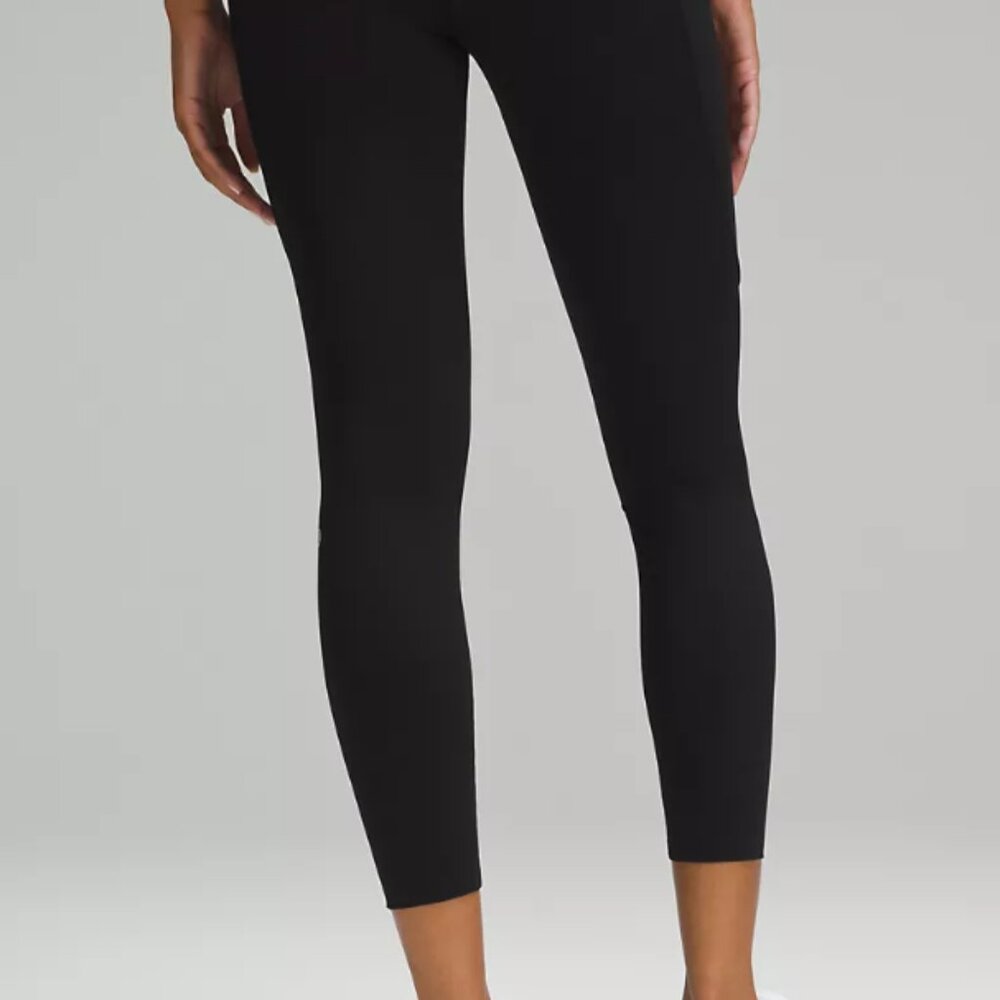 Lululemon Black Leggings Animal Logo Front Top Leg Size 4 NWOT